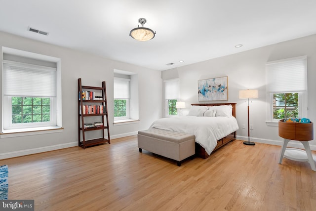 3929 Vacation Ln, Arlington, VA 22207 - bedroom with light wood-style flooring, baseboards, and recessed lighting