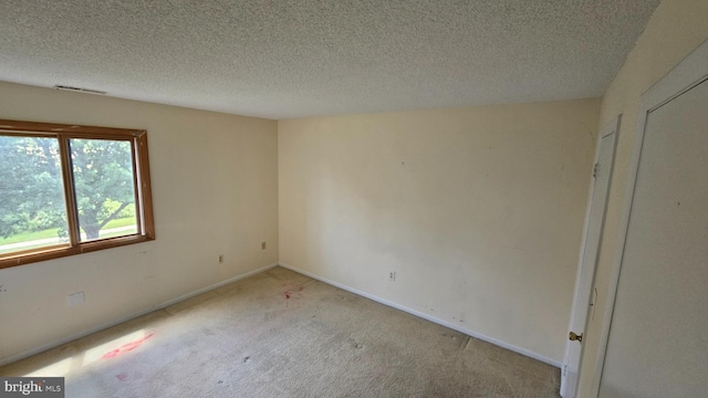 815 Ravens Crest Dr, Plainsboro, NJ 08536 - unfurnished room featuring carpet flooring, a textured ceiling, and baseboards