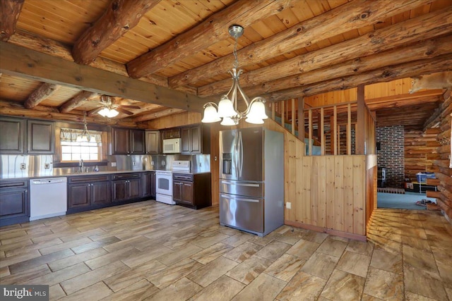 kitchen with dark brown cabinetry, light countertops, wooden ceiling, ceiling fan with notable chandelier, and white appliances