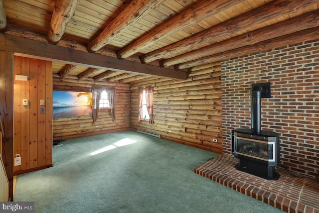 unfurnished living room featuring baseboard heating, carpet floors, rustic walls, and a wood stove