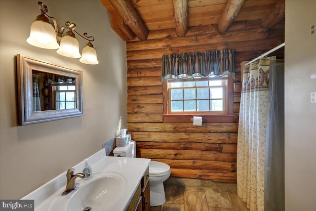 full bathroom with plenty of natural light, log walls, wooden ceiling, and beamed ceiling