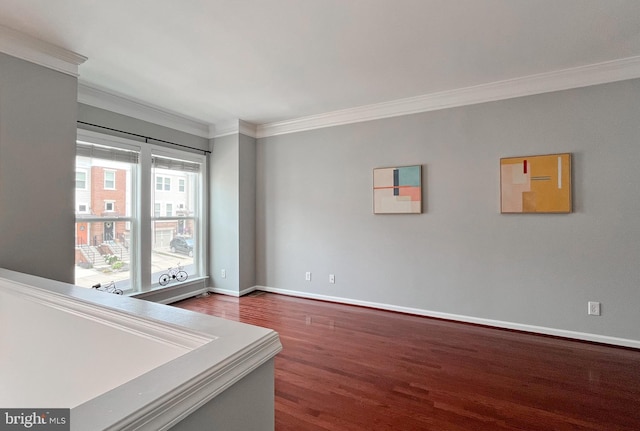 42667 New Dawn Ter, Brambleton, VA 20148 - spare room featuring ornamental molding, wood finished floors, and baseboards