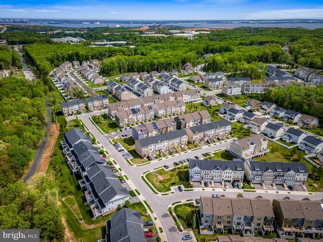 birds eye view of property with a residential view