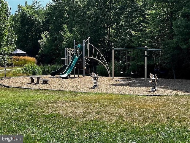 community play area with a yard