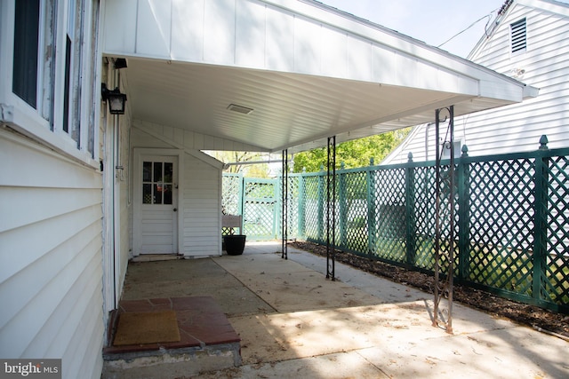 view of patio featuring fence
