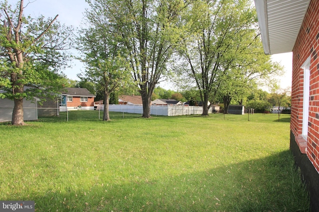 view of yard with fence