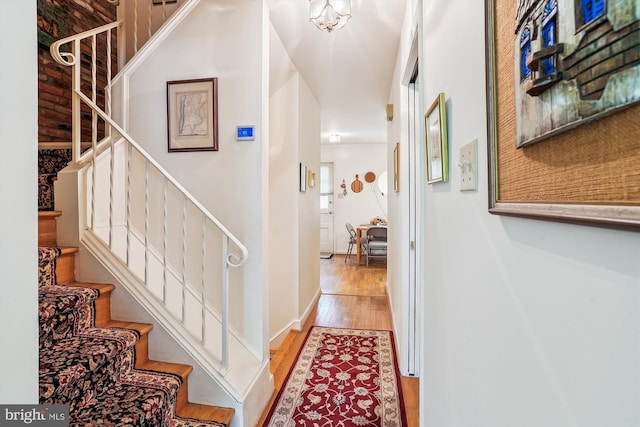 interior space featuring stairway and wood finished floors
