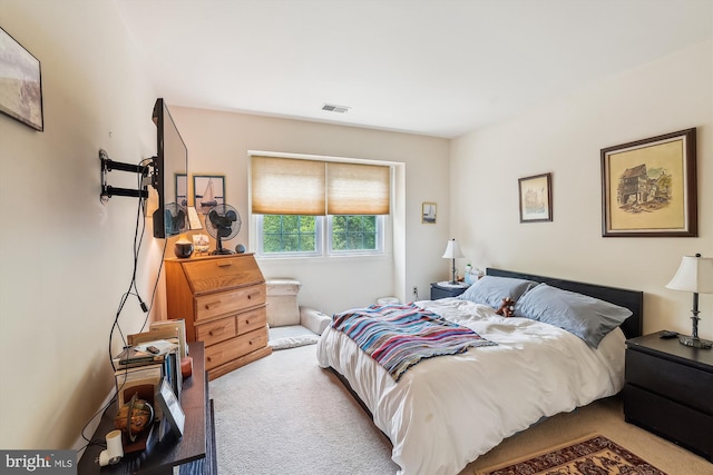 bedroom featuring carpet and visible vents