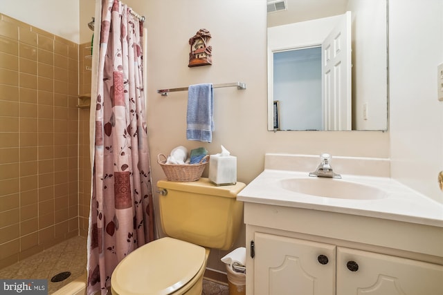 full bath featuring a stall shower, vanity, toilet, and visible vents