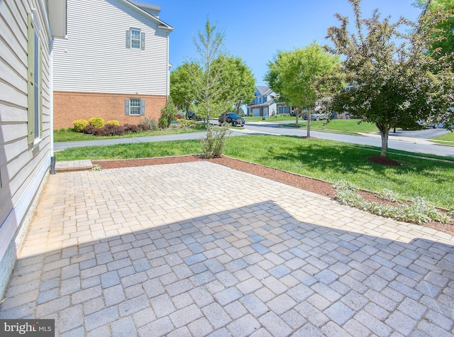 view of patio / terrace with a residential view