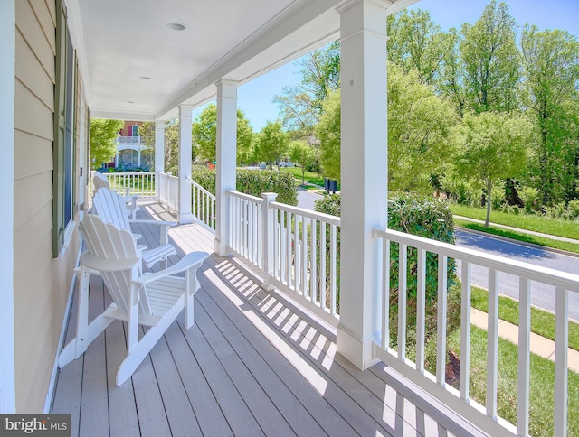 wooden deck featuring a porch