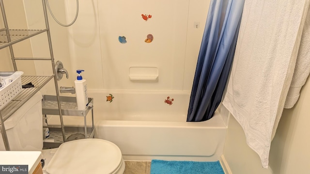 full bath with shower / bath combo and toilet