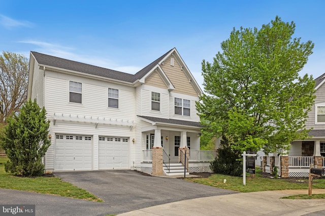 136 Roseville Ct, Boyce, VA 22620 - craftsman house featuring covered porch, an attached garage, and aphalt driveway