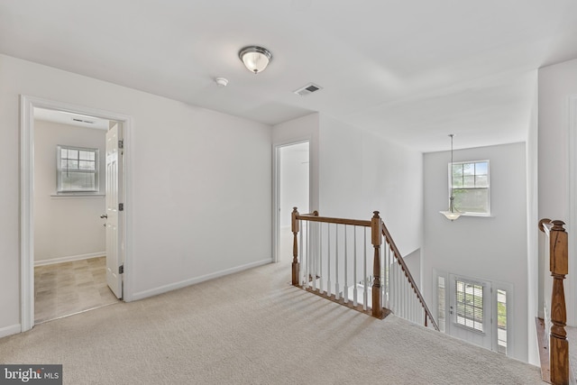 136 Roseville Ct, Boyce, VA 22620 - corridor with baseboards, visible vents, carpet, and an upstairs landing