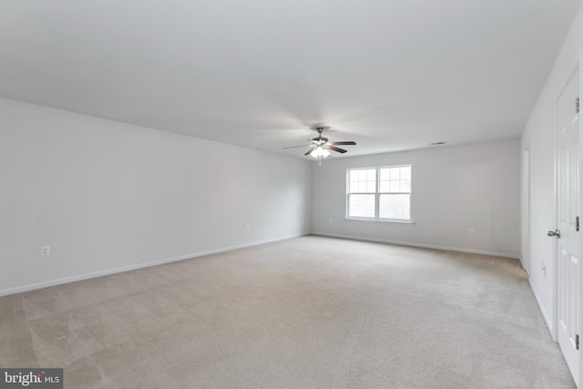 136 Roseville Ct, Boyce, VA 22620 - spare room featuring light colored carpet, a ceiling fan, and baseboards