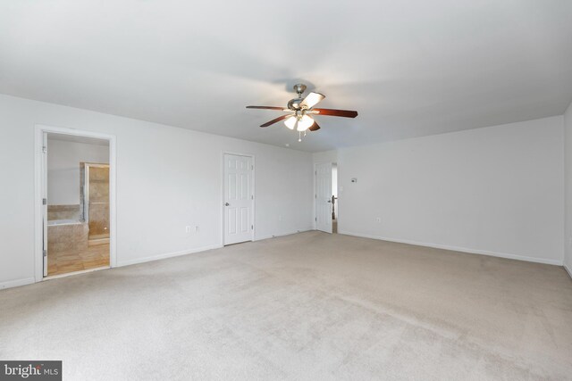 136 Roseville Ct, Boyce, VA 22620 - spare room featuring baseboards, a ceiling fan, and light colored carpet