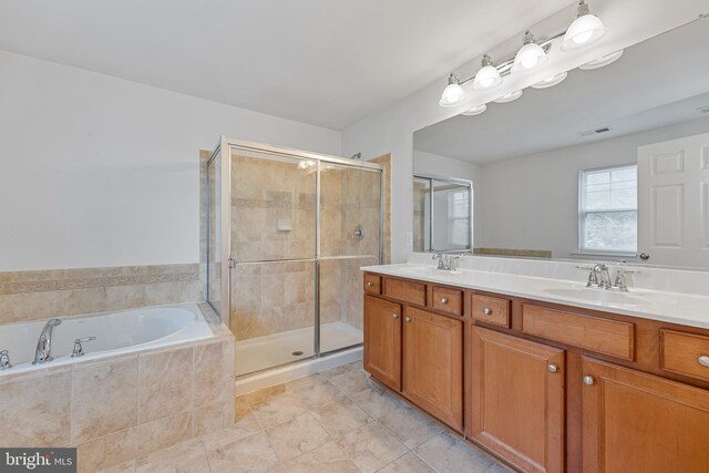 136 Roseville Ct, Boyce, VA 22620 - bathroom featuring a garden tub, a sink, double vanity, and a shower stall