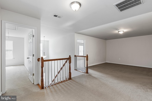 136 Roseville Ct, Boyce, VA 22620 - hallway featuring visible vents, attic access, carpet, and an upstairs landing