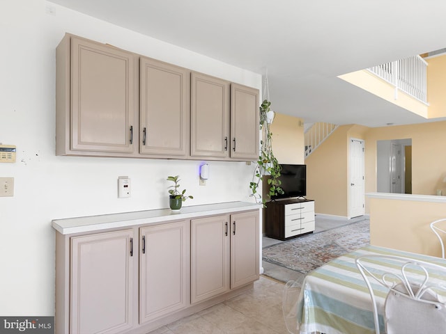 kitchen featuring light countertops and light tile patterned floors