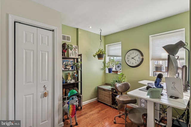538 Moore St, Philadelphia, PA 19148 - office area featuring visible vents, baseboards, and wood finished floors