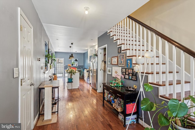 538 Moore St, Philadelphia, PA 19148 - hallway with wood-type flooring and stairway