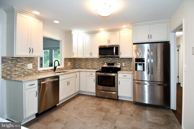130 Great Lake Dr, Annapolis, MD 21403 - kitchen featuring stainless steel appliances, a sink, backsplash, white cabinetry, and recessed lighting