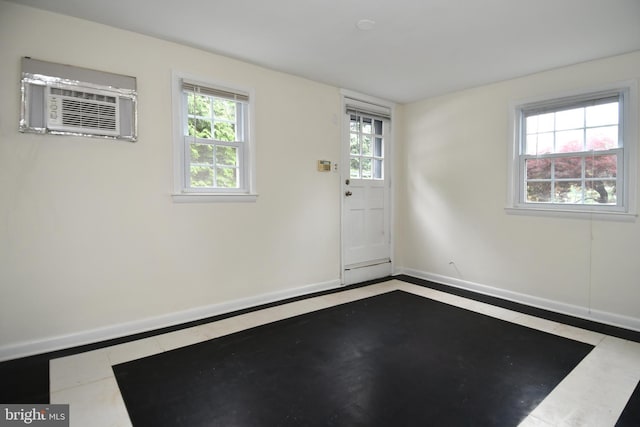 130 Great Lake Dr, Annapolis, MD 21403 - spare room with baseboards, healthy amount of natural light, and an AC wall unit