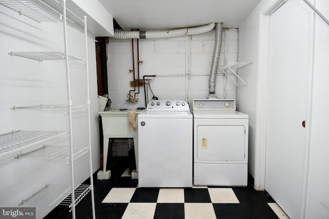 130 Great Lake Dr, Annapolis, MD 21403 - clothes washing area featuring washer and clothes dryer and tile patterned floors