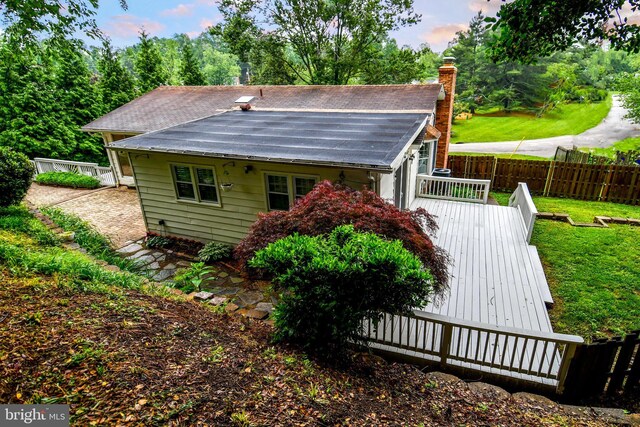 130 Great Lake Dr, Annapolis, MD 21403 - rear view of property featuring a wooden deck and a chimney