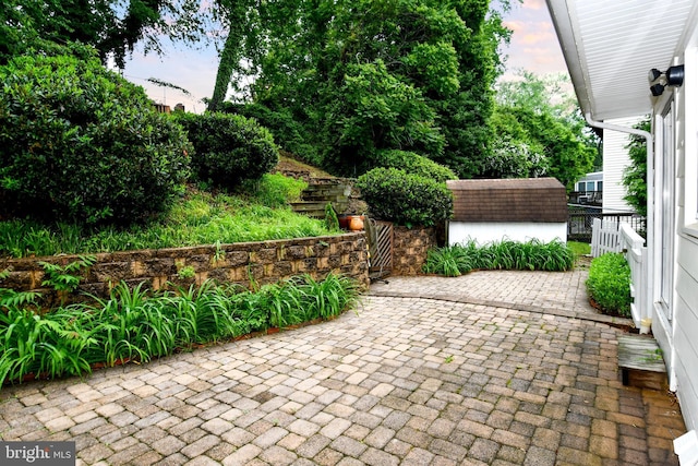 130 Great Lake Dr, Annapolis, MD 21403 - view of patio / terrace featuring a storage shed and an outbuilding