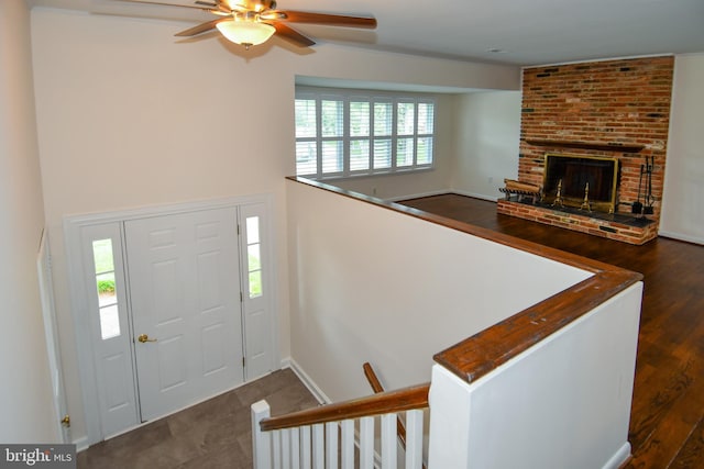 130 Great Lake Dr, Annapolis, MD 21403 - entrance foyer with a ceiling fan, a fireplace, baseboards, and wood finished floors