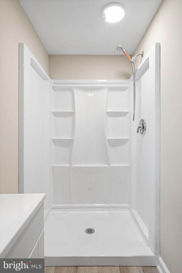 bathroom featuring a stall shower