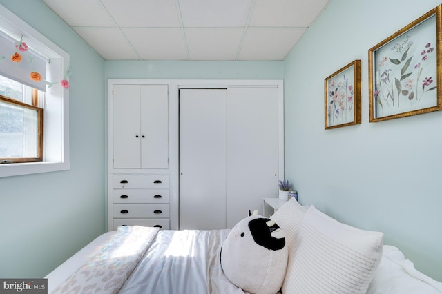 bedroom with a drop ceiling