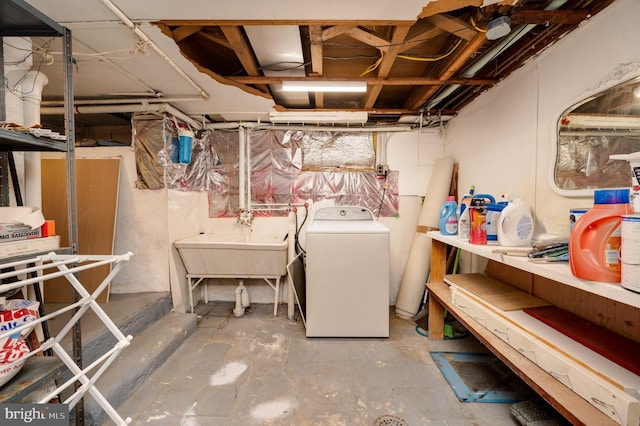 unfinished basement featuring washer / clothes dryer