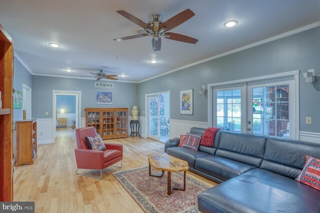 living area with recessed lighting, ceiling fan, french doors, and light wood-style floors