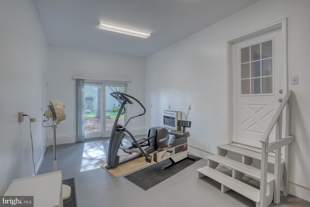exercise room with baseboards