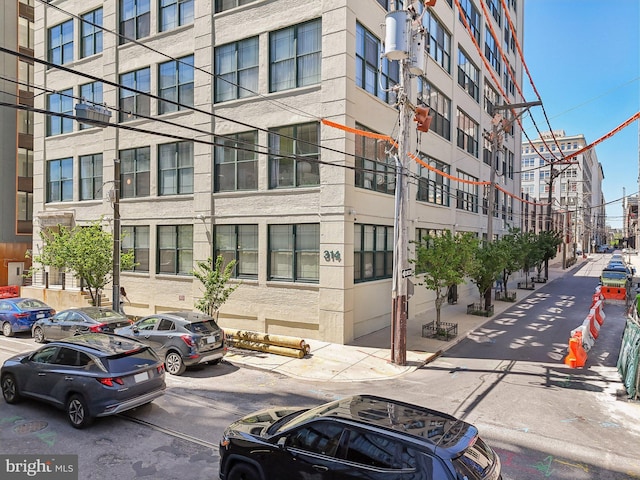 view of property with uncovered parking