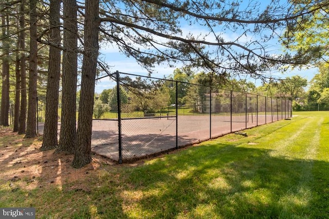 5821 Royal Ridge Dr Unit F, Springfield, VA 22152 - view of basketball court featuring a lawn and fence