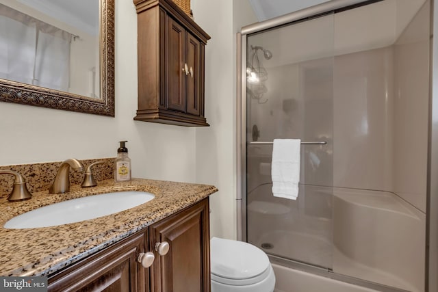 133 Teal Dr, Pasadena, MD 21122 - full bathroom featuring a shower stall, toilet, and vanity