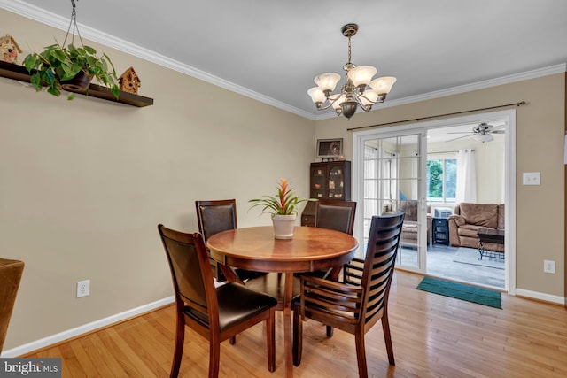 133 Teal Dr, Pasadena, MD 21122 - dining room with a chandelier, light wood-style flooring, baseboards, and ornamental molding