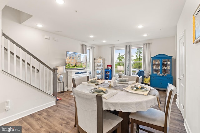 10424 Ratcliffe Trl, Manassas, VA 20110 - dining space featuring stairway, wood finished floors, baseboards, and recessed lighting