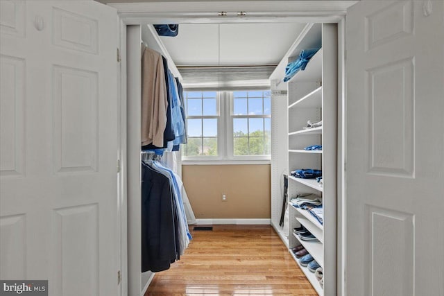 1301 Kelly Ct, Herndon, VA 20170 - spacious closet featuring light wood finished floors