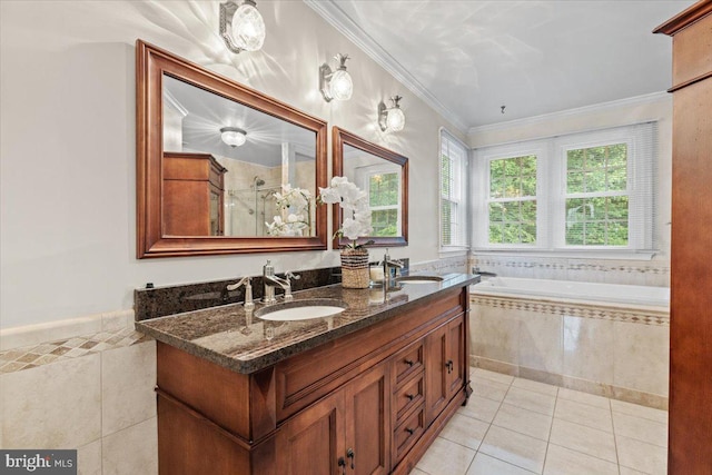 1301 Kelly Ct, Herndon, VA 20170 - full bathroom with tile patterned flooring, double vanity, a garden tub, a shower stall, and crown molding