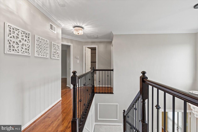 1301 Kelly Ct, Herndon, VA 20170 - corridor featuring an upstairs landing, wood finished floors, ornamental molding, and baseboards