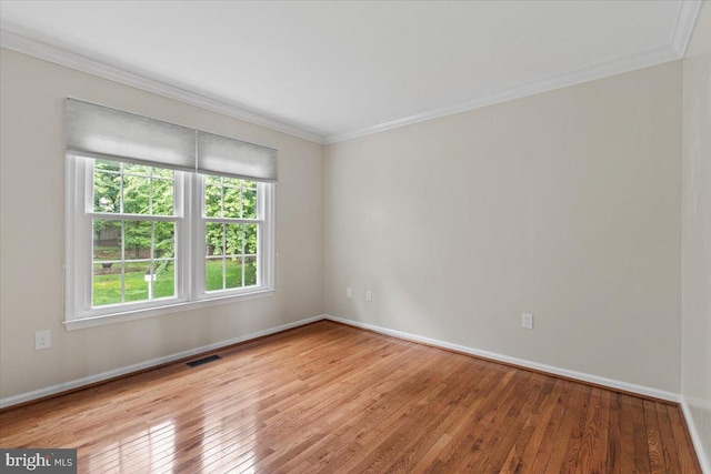 1301 Kelly Ct, Herndon, VA 20170 - empty room with crown molding, hardwood / wood-style floors, and baseboards