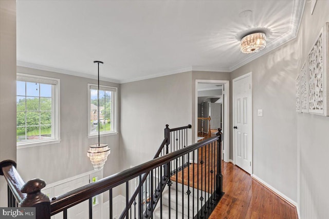 1301 Kelly Ct, Herndon, VA 20170 - corridor featuring an upstairs landing, wood finished floors, crown molding, and baseboards
