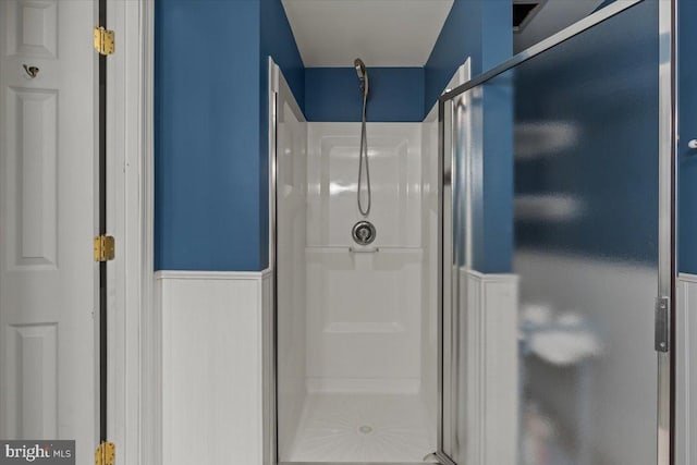 1301 Kelly Ct, Herndon, VA 20170 - full bathroom featuring wainscoting and a shower stall