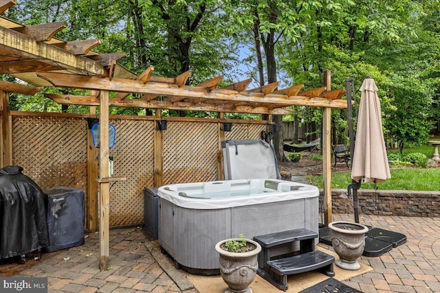 1301 Kelly Ct, Herndon, VA 20170 - view of patio featuring a hot tub and a pergola