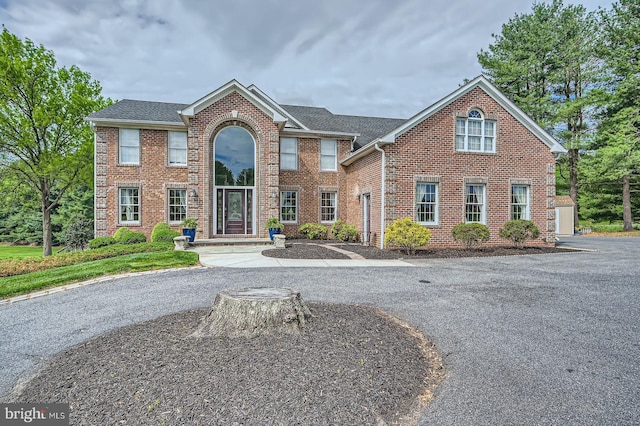 12439 Barnard Way SW, West Friendship, MD 21794 - colonial-style house with brick siding and a shingled roof