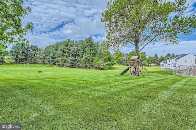 12439 Barnard Way SW, West Friendship, MD 21794 - view of yard featuring a deck and a playground